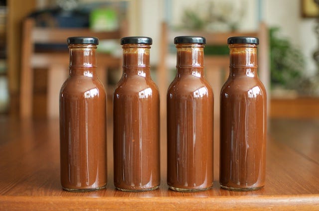 four-finished-jars-of-barbecue-sauce