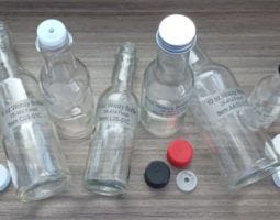 Woozy Bottles Fillmore Container