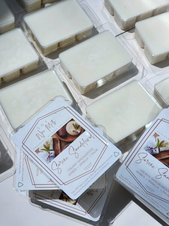 This is an image of filled melt trays - some uncovered, some with Fillmore Container's designed Wax Melt Label. 